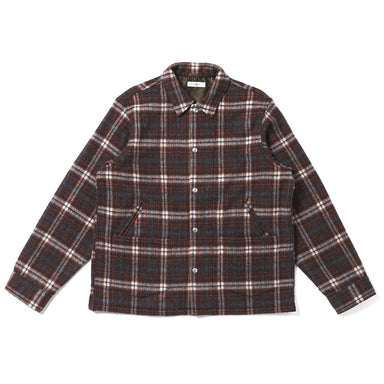 A dark brown and black plaid button-up shirt jacket with white and beige stripes, laid flat on a white background.