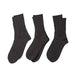 Three pairs of dark charcoal gray crew socks arranged side by side on a clean white background.