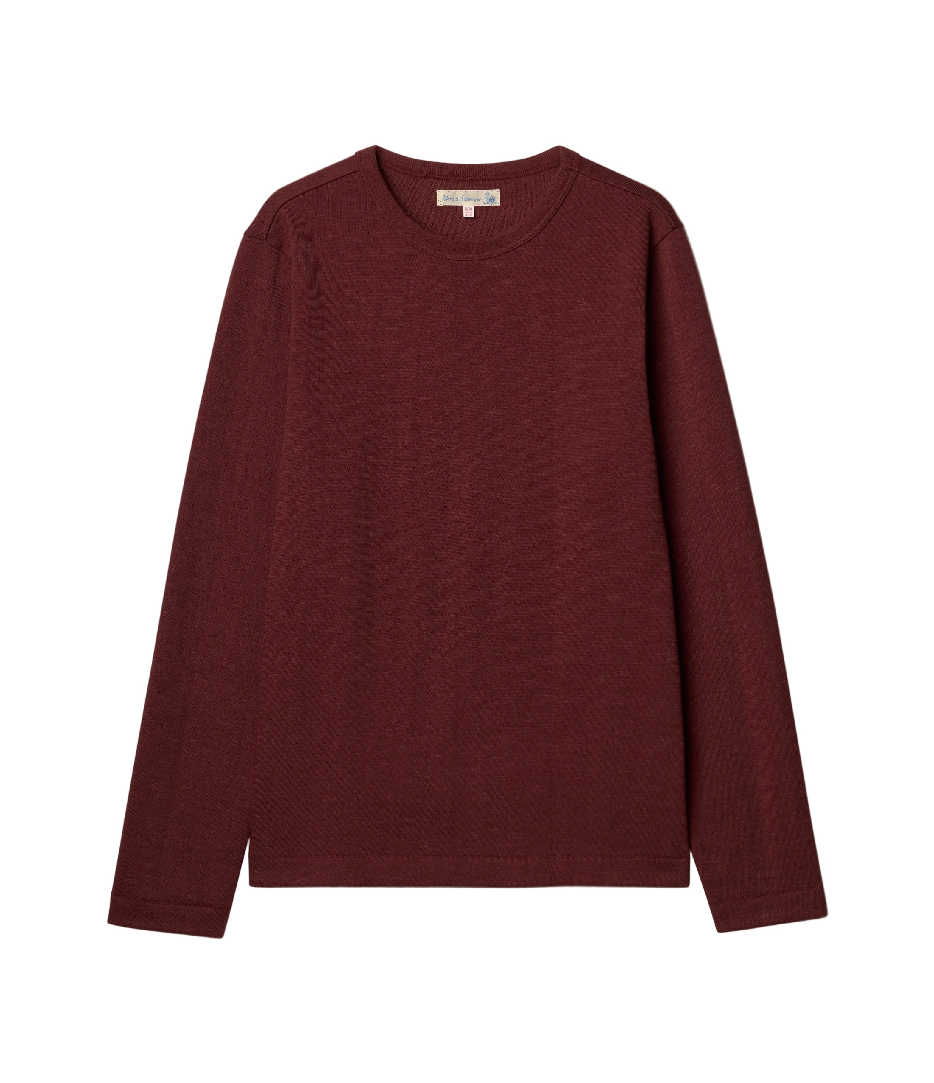 A dark burgundy long-sleeve crewneck sweater laid flat against a light off-white background.