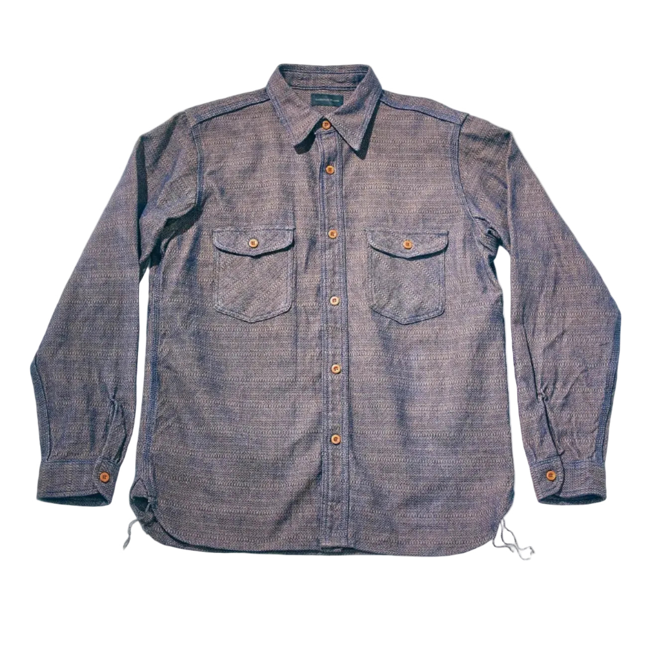 Blue checkered shirt with black accents on a white background