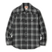 A long-sleeve plaid button-up shirt in black and white, laid flat against a white background. The shirt features a classic plaid pattern with two buttoned chest pockets and a collar label.