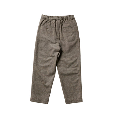 A pair of brown tweed trousers with an elastic waistband, laid flat against a clean white background.