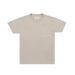 A light beige crewneck t-shirt with a single chest pocket, displayed flat against a light gray background.
