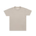 A light beige crewneck t-shirt with short sleeves, laid flat against a light gray background.