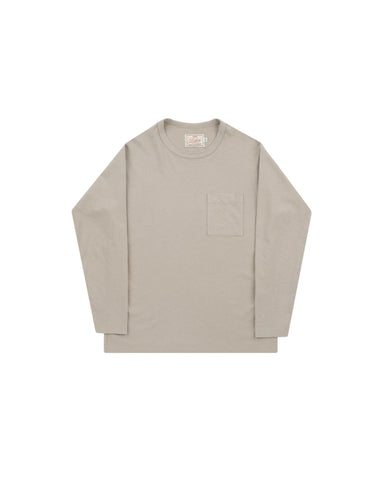 A light beige long-sleeve crewneck shirt with a single chest pocket, laid flat against a light gray background.