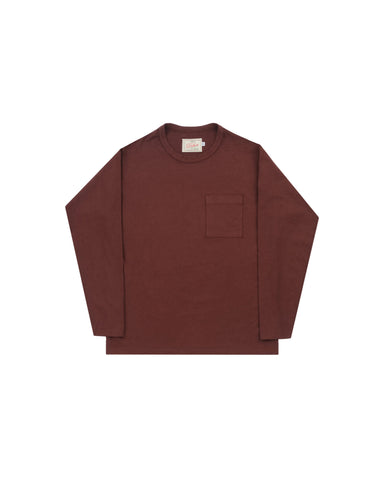 A dark reddish-brown long-sleeve crewneck shirt with a single chest pocket, laid flat against a light gray background.