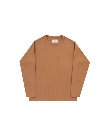 A long-sleeve crewneck shirt in a warm camel brown color, featuring a single patch pocket on the left chest, laid flat against a light gray background.