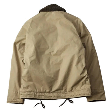 Beige jacket with brown lining on a gray background