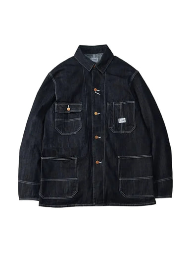 A dark indigo denim work jacket with white contrast stitching, buttoned front, and four front pockets, displayed flat against a neutral gray background.