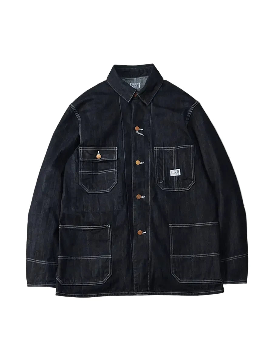 A dark indigo denim work jacket with white contrast stitching, buttoned front, and four front pockets, displayed flat against a neutral gray background.