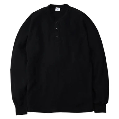 Black long-sleeve shirt on a gray background