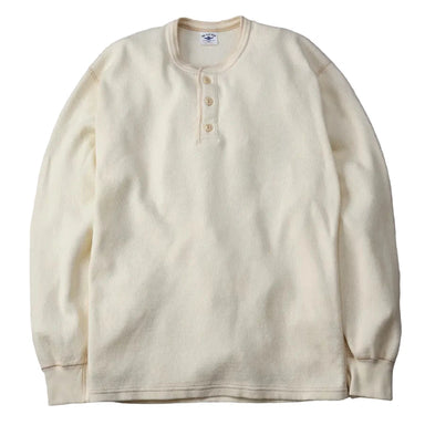 Beige long-sleeve shirt on a gray background