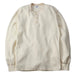Beige long-sleeve shirt on a gray background