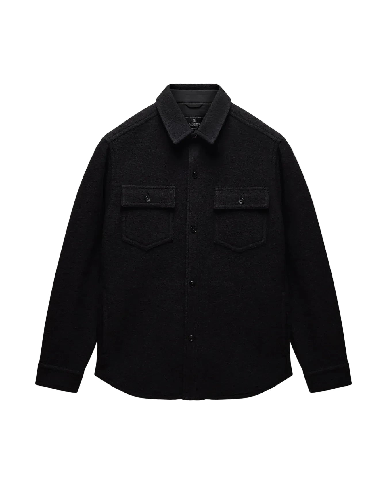 A black long-sleeve button-up shirt jacket with two buttoned chest flap pockets, displayed flat against a light gray background.