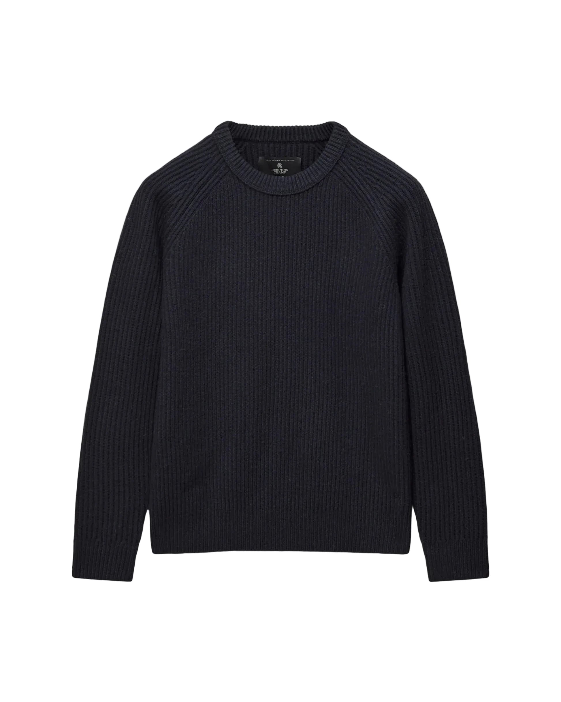 A dark navy ribbed knit crewneck sweater with raglan sleeves, displayed flat against a light gray background.