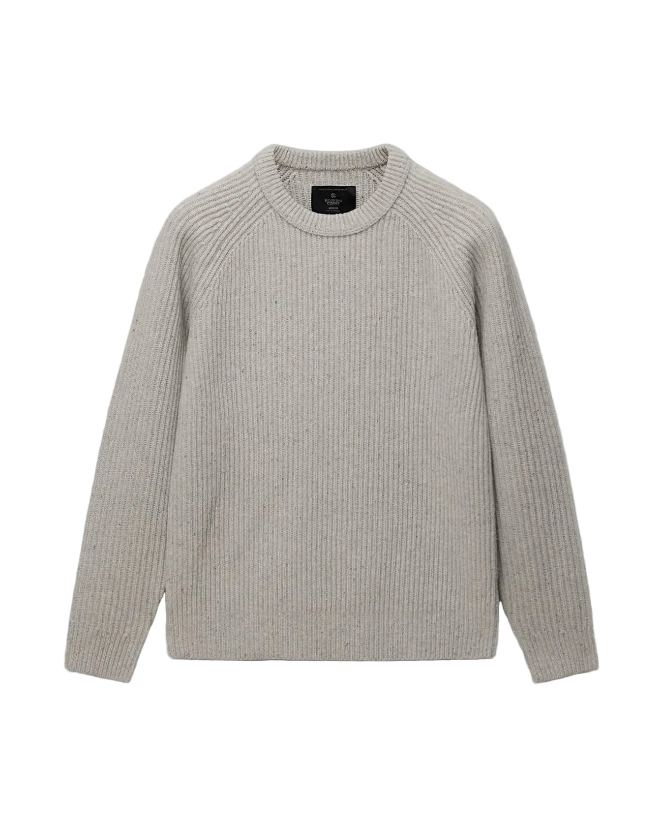 A light gray ribbed knit crewneck sweater with raglan sleeves, displayed flat against a light gray background.
