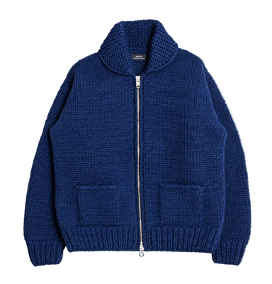 A navy blue chunky-knit zip-up cardigan sweater with a high ribbed collar, two front patch pockets, and a silver-tone zipper, shown flat on a white background.