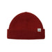Red knit beanie with a brand label on a light gray background