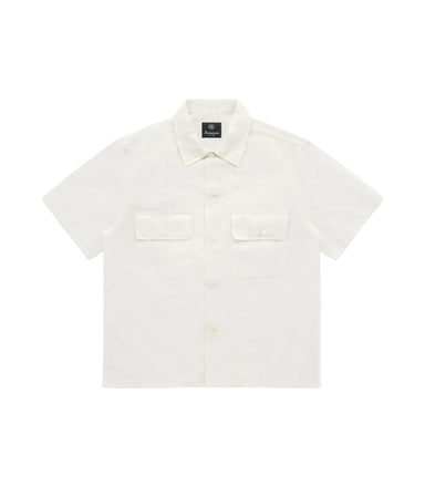 White shirt with a small black label on a white background