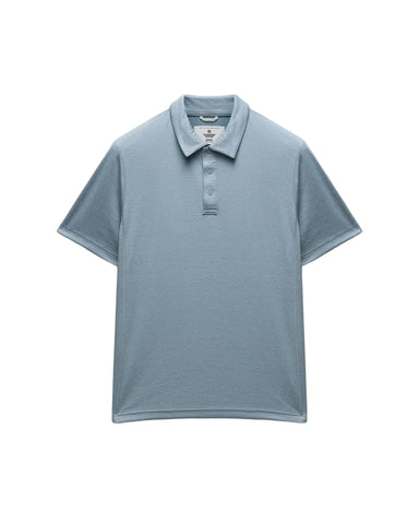 Light blue polo shirt on a light gray background