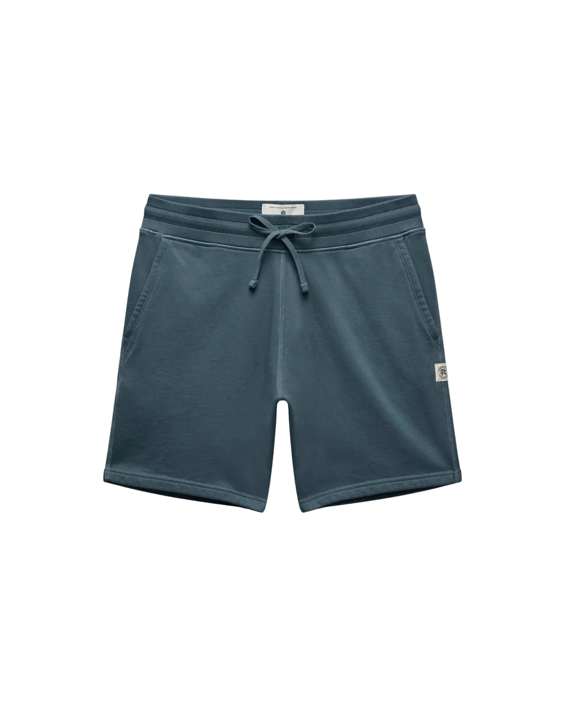 Blue shorts with a drawstring on a light gray background