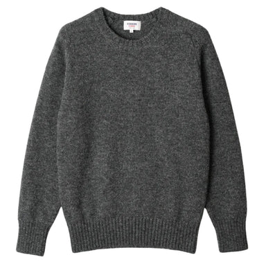 Gray sweater on a beige background