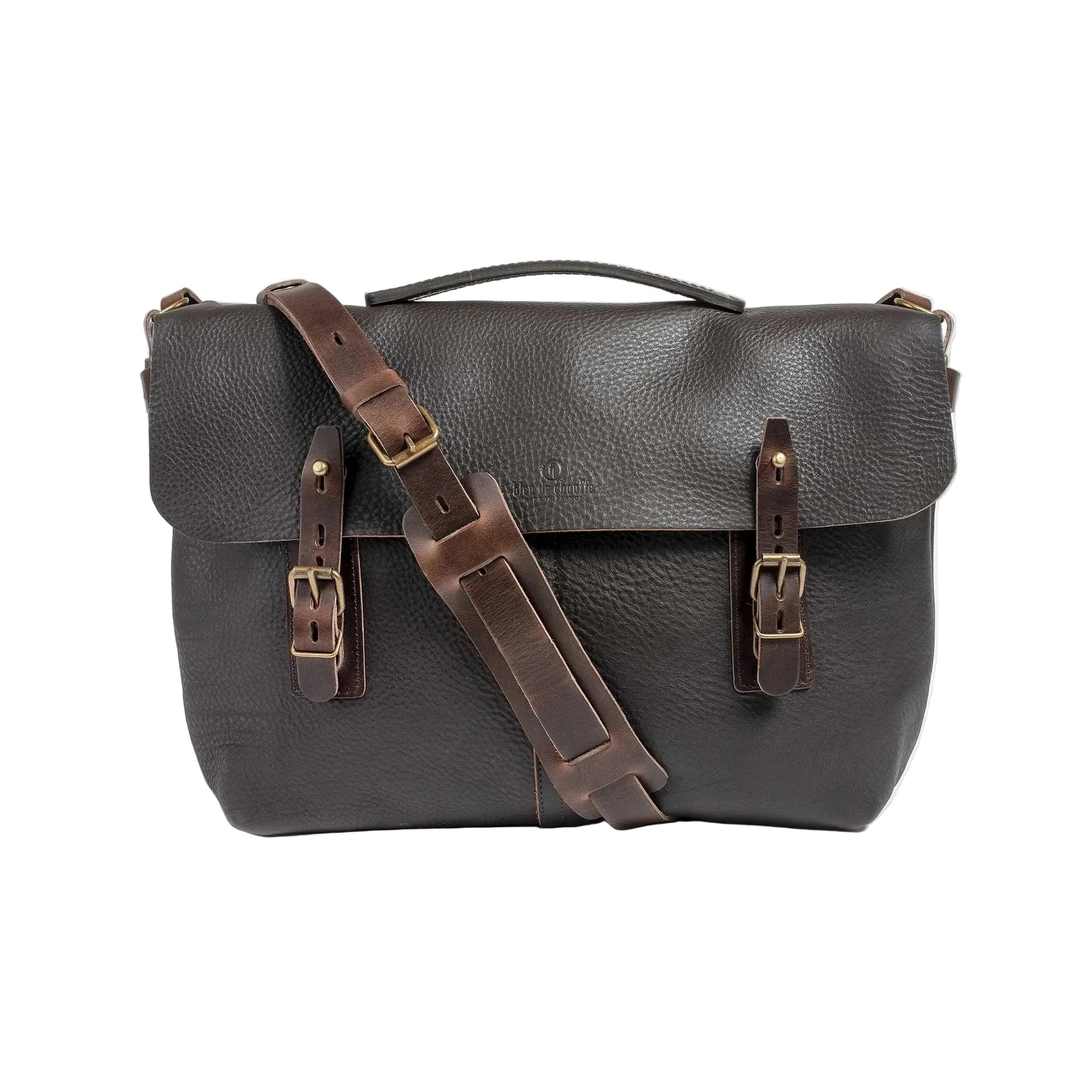Dark brown textured leather messenger bag with a top handle, adjustable shoulder strap, and two buckle closures on the front flap, shown against a light gray background.